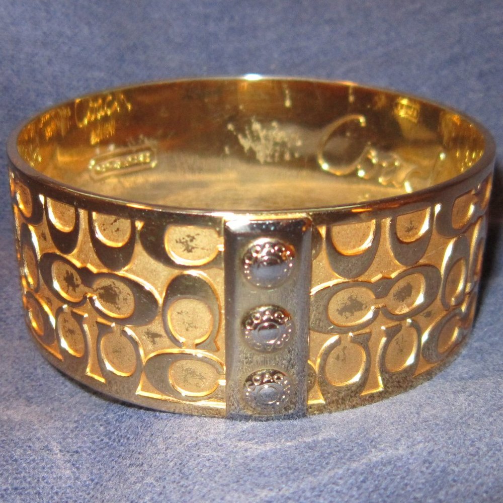 gold-tone COACH cuff bracelet C logo with button-snap-look design jewelry